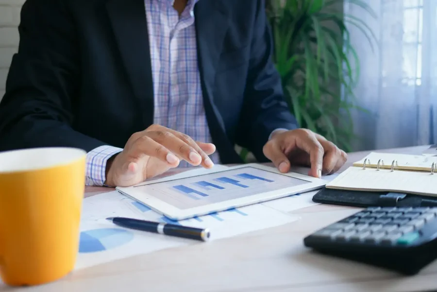 Accountant reviewing GST returns and paperwork for a Whangarei business